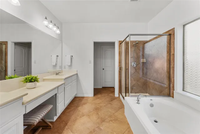 a bedroom with a bed and dresser