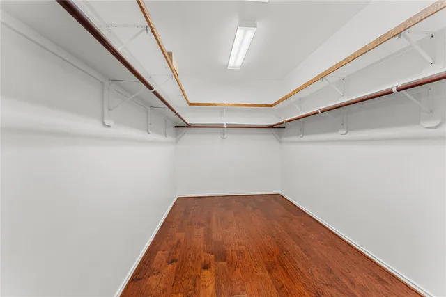 a bathroom with a sink double vanity and a mirror