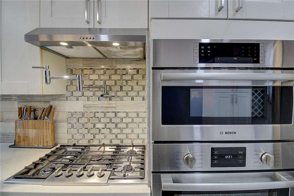 3064 Montclair Circle Southeast Smyrna, GA 30080 - Photo 11 of 48 a stove top oven sitting inside of a kitchen