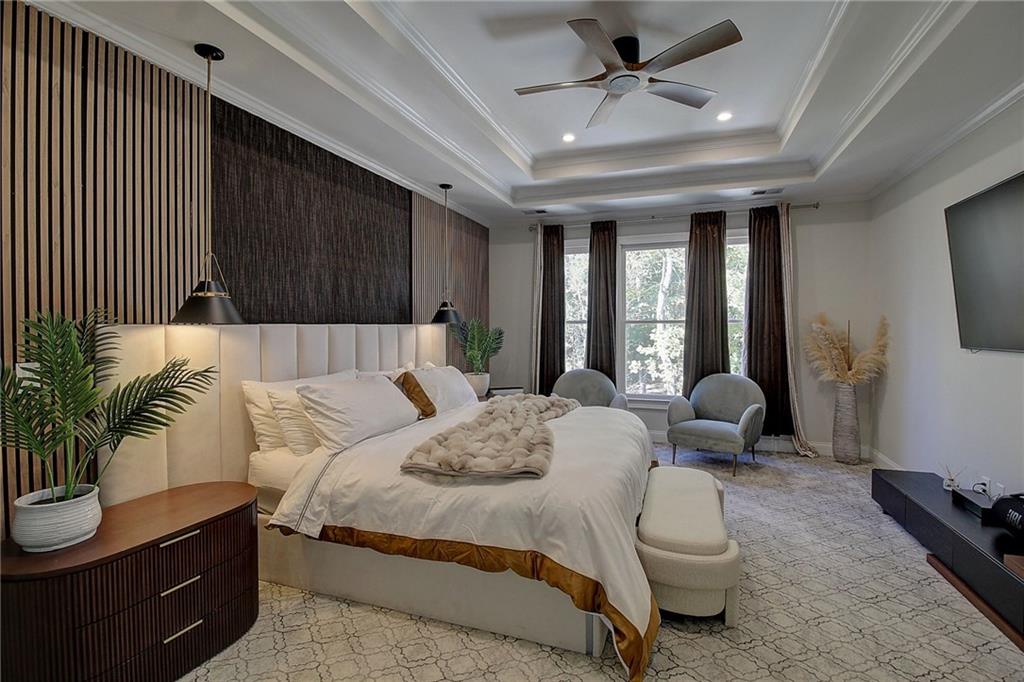 3064 Montclair Circle Southeast Smyrna, GA 30080 - Photo 17 of 48 a bed room with a bed and a couch