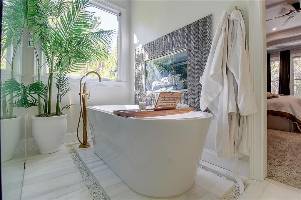 3064 Montclair Circle Southeast Smyrna, GA 30080 - Photo 22 of 48 a dining room with a table and chairs