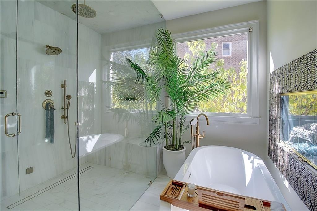3064 Montclair Circle Southeast Smyrna, GA 30080 - Photo 23 of 48 a bath tub sitting in front of a window