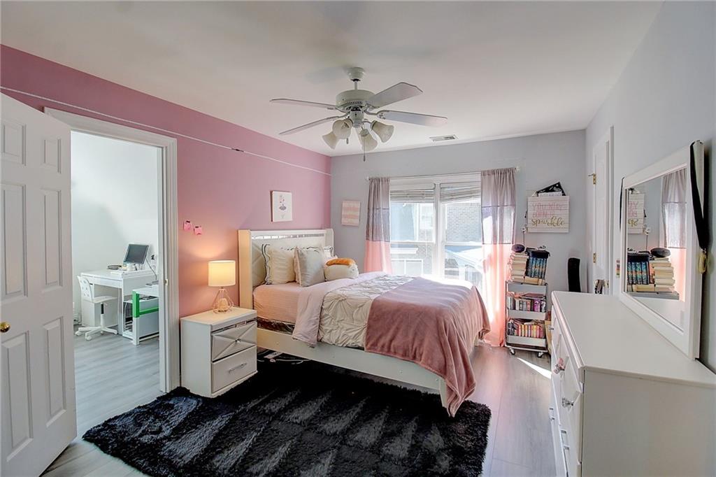 3064 Montclair Circle Southeast Smyrna, GA 30080 - Photo 27 of 48 a bed room with a bed furniture and a window