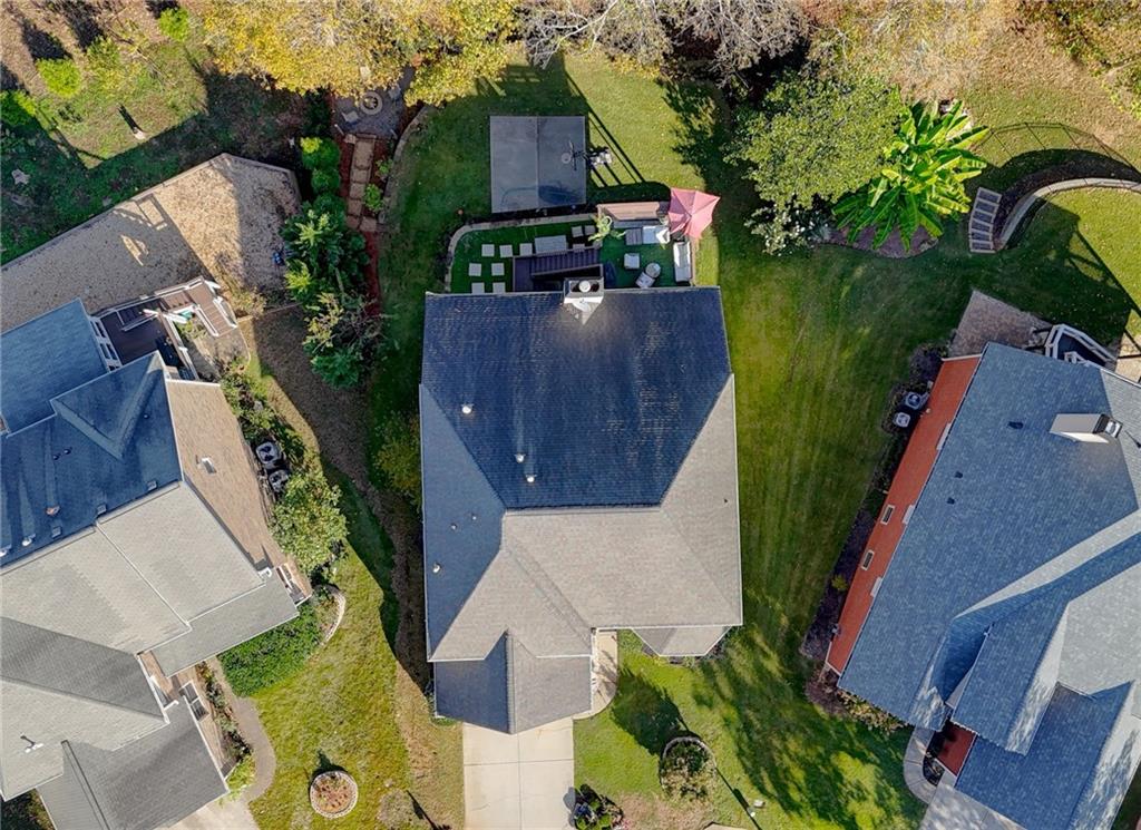 3064 Montclair Circle Southeast Smyrna, GA 30080 - Photo 3 of 48 an aerial view of house with yard swimming pool and outdoor seating