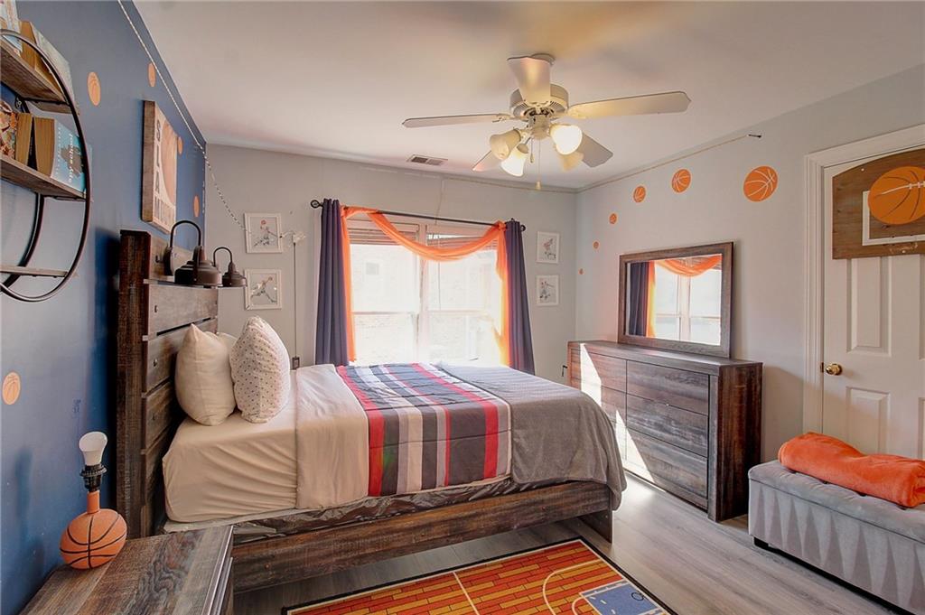 3064 Montclair Circle Southeast Smyrna, GA 30080 - Photo 31 of 48 a bedroom with a bed and window