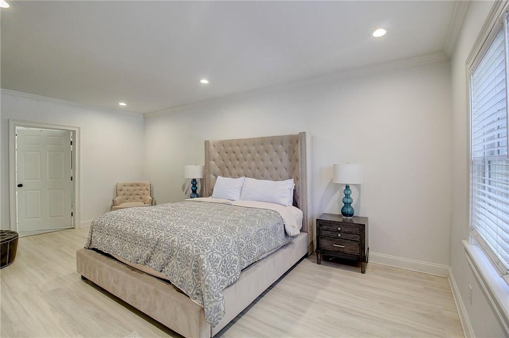 3064 Montclair Circle Southeast Smyrna, GA 30080 - Photo 40 of 48 a spacious bedroom with a bed and a window