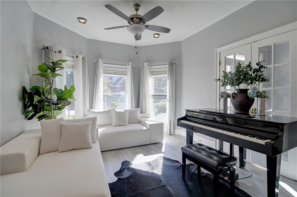 3064 Montclair Circle Southeast Smyrna, GA 30080 - Photo 7 of 48 a living room with furniture and a potted plant
