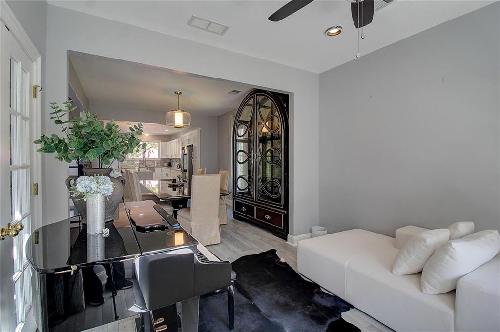 3064 Montclair Circle Southeast Smyrna, GA 30080 - Photo 8 of 48 a workspace with furniture and wooden floor