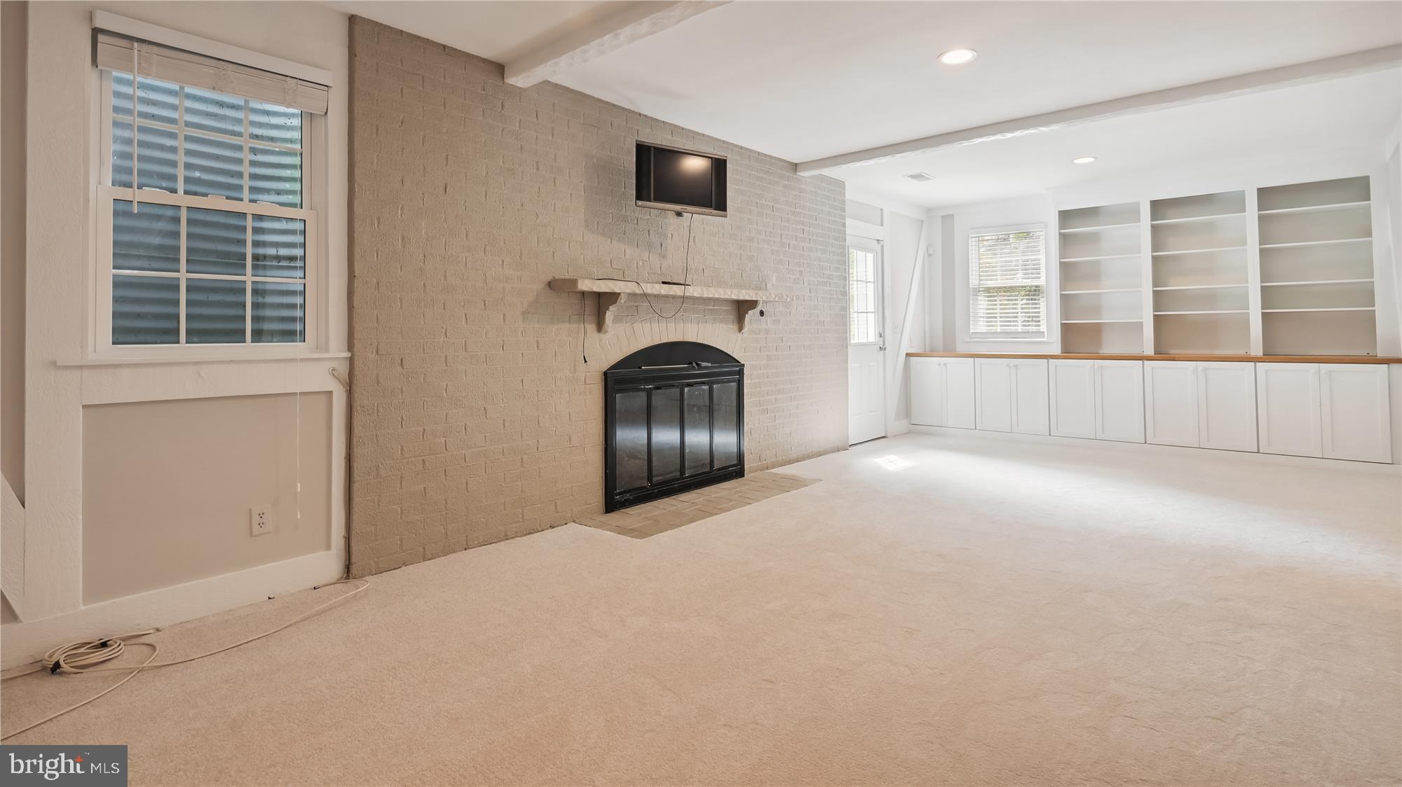1313 Merrie Ridge Road McLean, VA 22101 - Photo 46 of 72 Large rec room with built-ins and walk-out