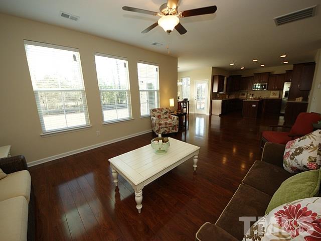 2727 Follow Me Way Raleigh, NC 27610 - Photo 12 of 18 a living room with furniture and a large window