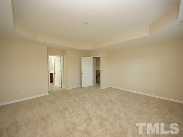 2727 Follow Me Way Raleigh, NC 27610 - Photo 15 of 18 an empty room with windows