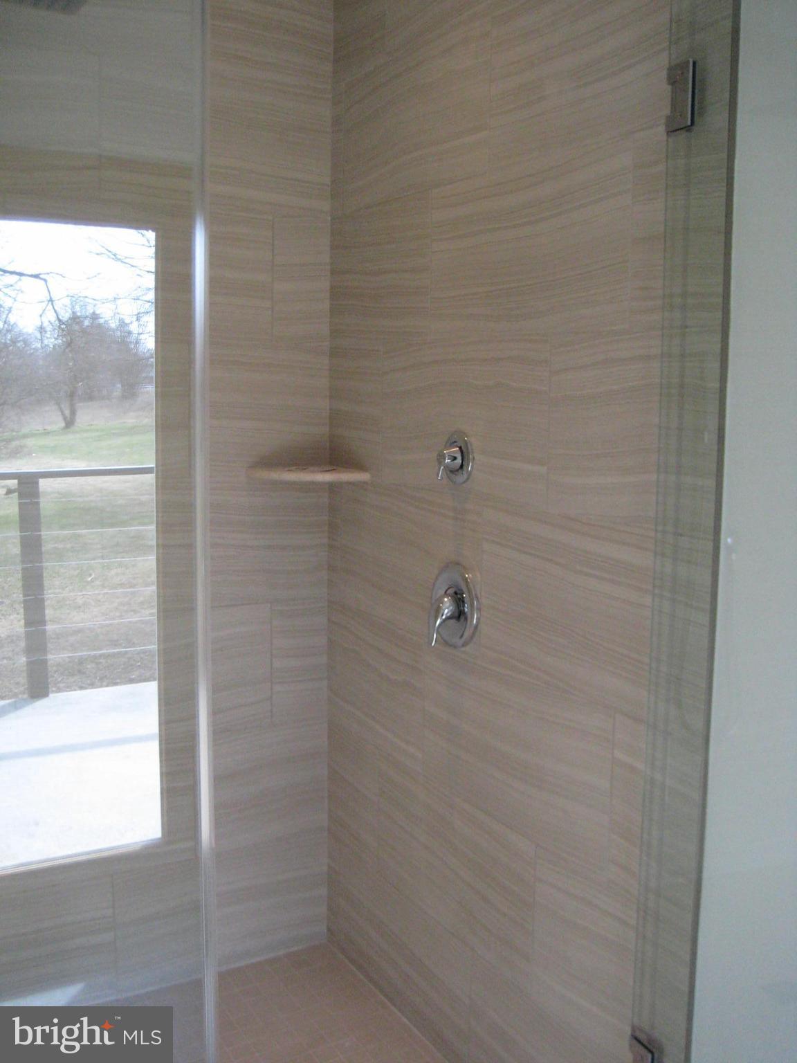 27512 Ridge Road Damascus, MD 20872 - Photo 12 of 17 HUGE RAIN SHOWER W/ UPGRADE TILE AND SHOWER DOOR