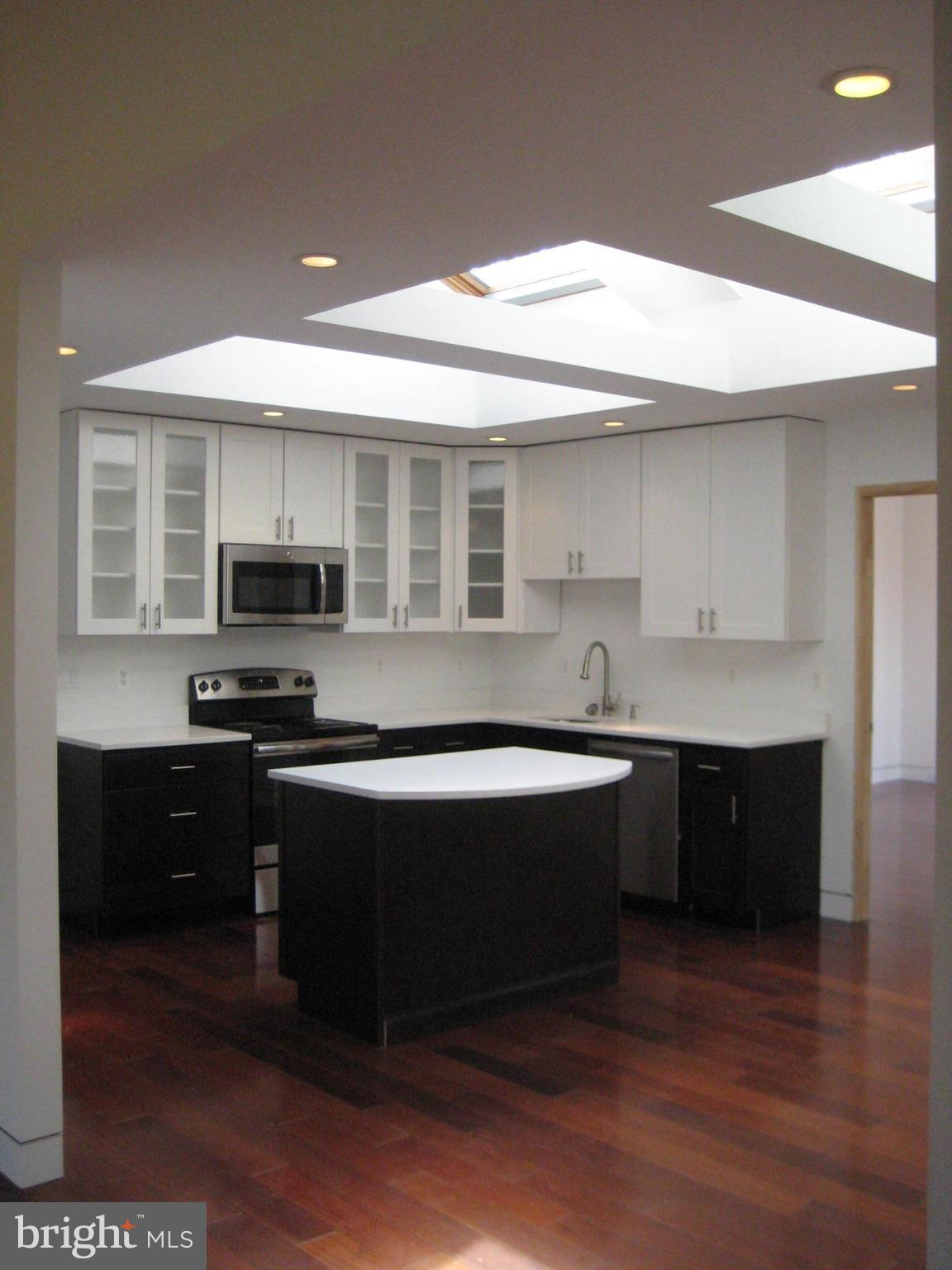 27512 Ridge Road Damascus, MD 20872 - Photo 3 of 17 REMOTE CONTROL MECHANICAL SKYLIGHTS IN KITCHEN