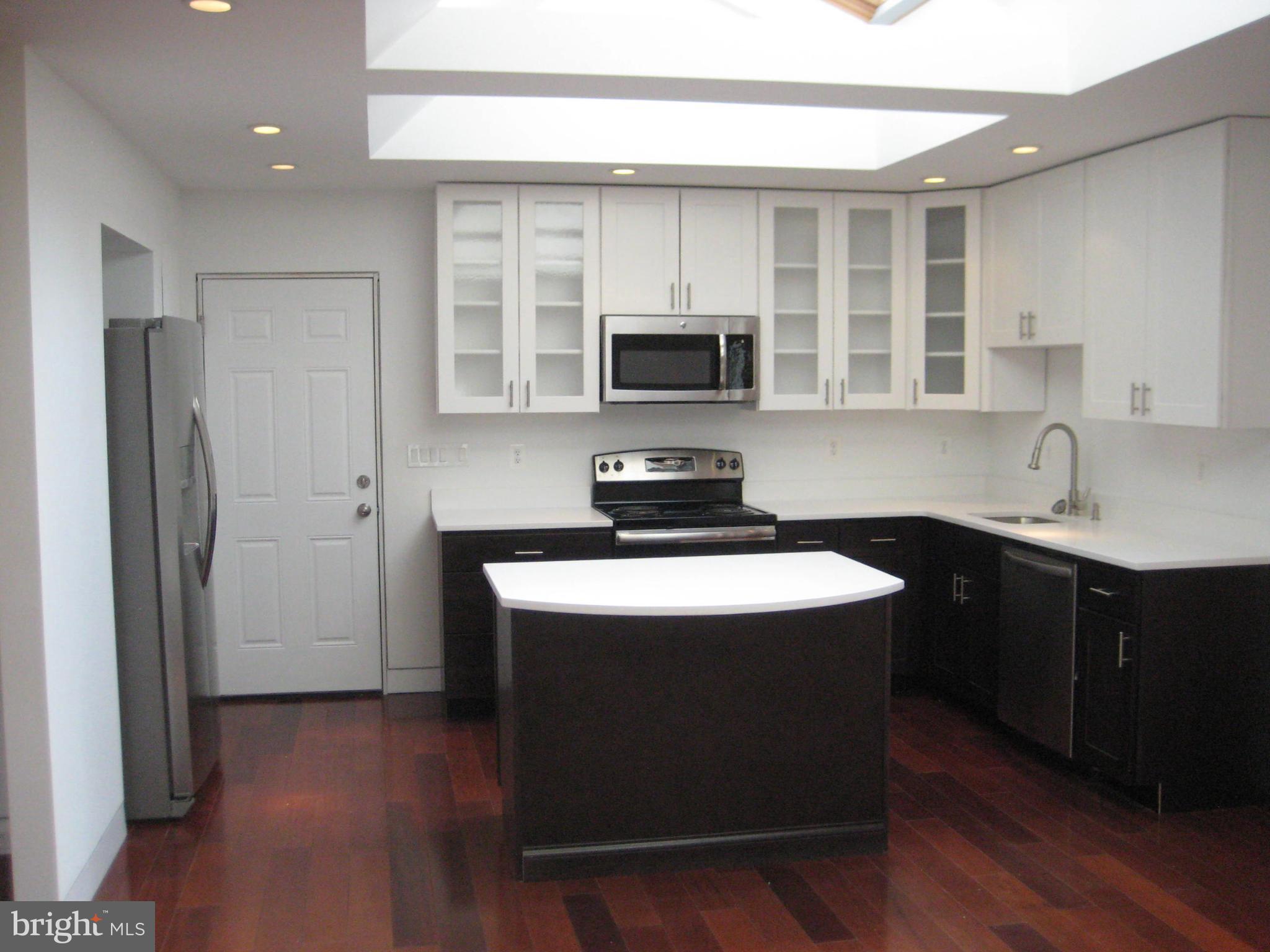 27512 Ridge Road Damascus, MD 20872 - Photo 9 of 17 BRAND NEW CUSTOM CABINETRY WITH GLASS DOORS