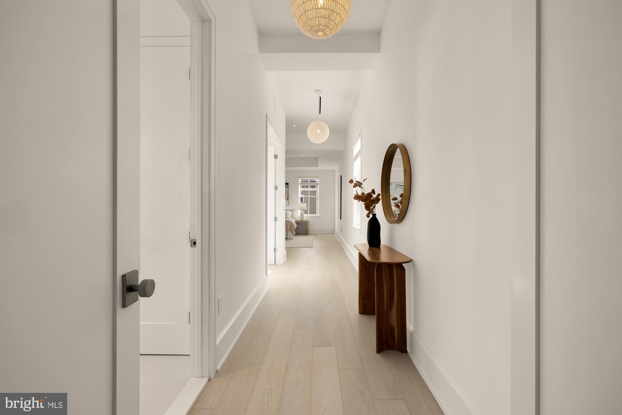 329 8th Street Northeast Washington, DC 20002 - Photo 21 of 51 a view of a hallway with entryway wooden floor and staircase