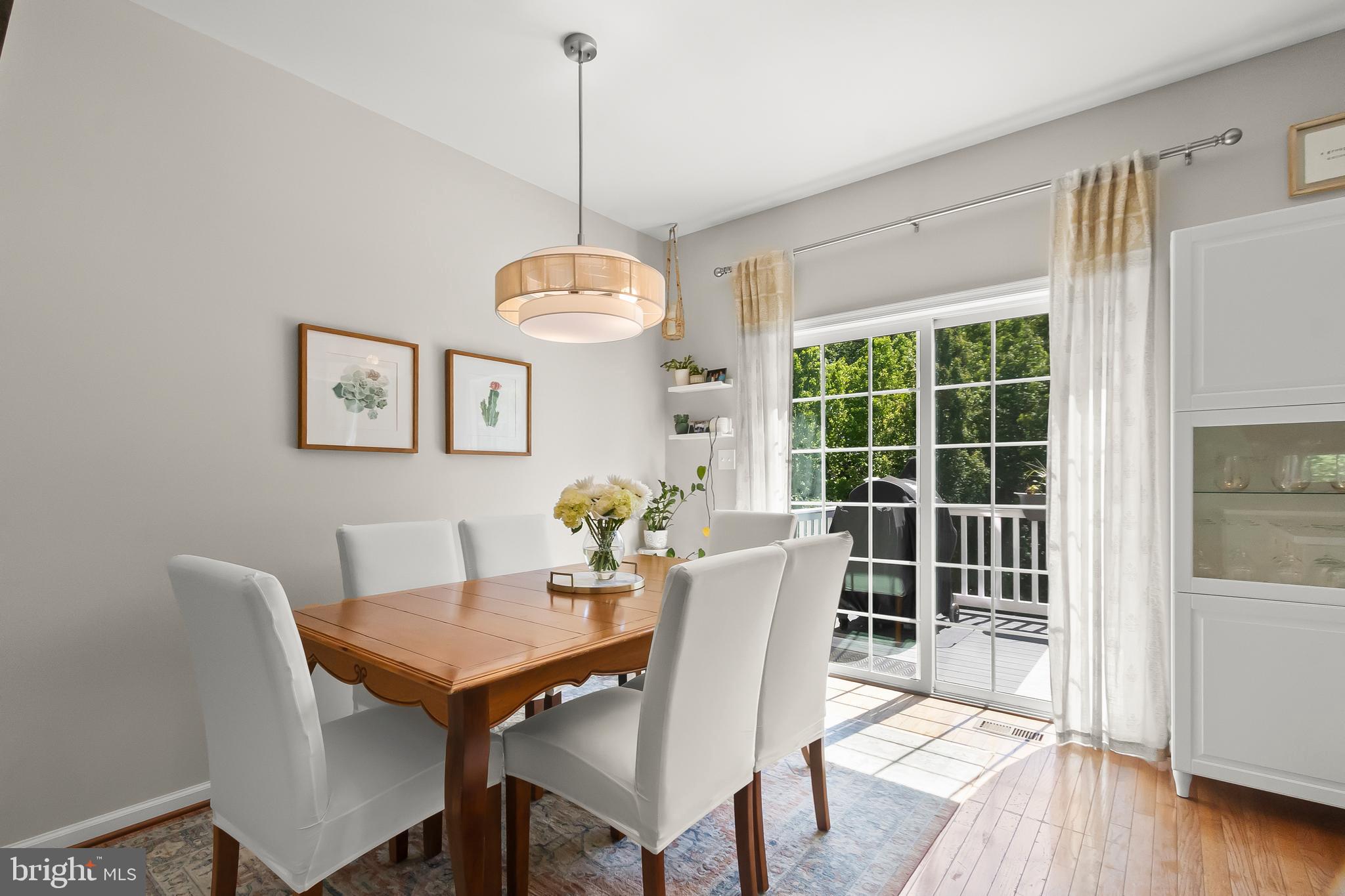 527 Jacobsen Drive Newark, DE 19702 - Photo 22 of 60 a view of a dining room with furniture window and wooden floor