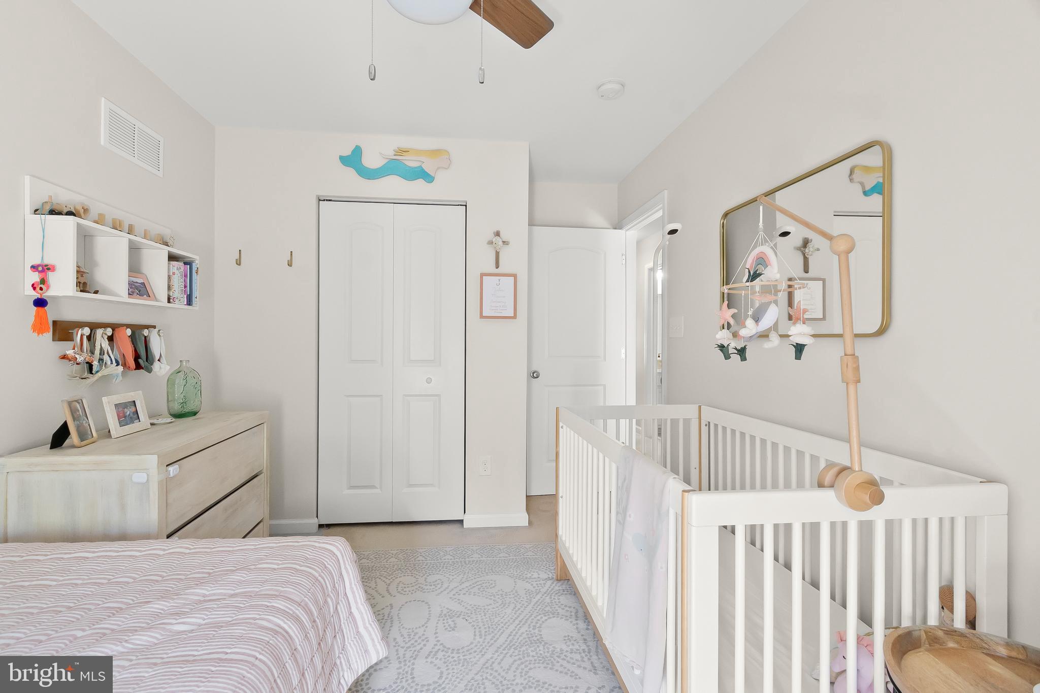 527 Jacobsen Drive Newark, DE 19702 - Photo 41 of 60 a bedroom with a bed and a cabinets