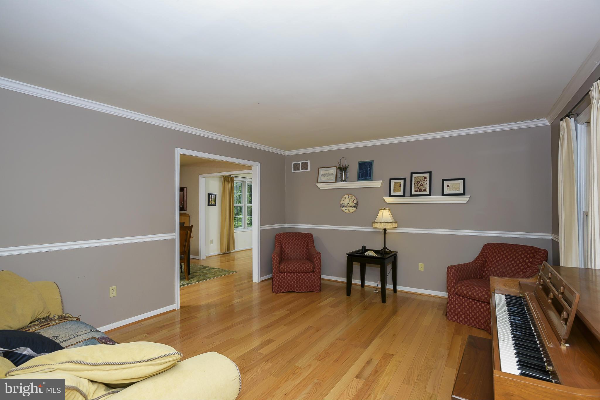 1202 Jones Station Road Arnold, MD 21012 - Photo 3 of 30 Living Room has decorative moldings.