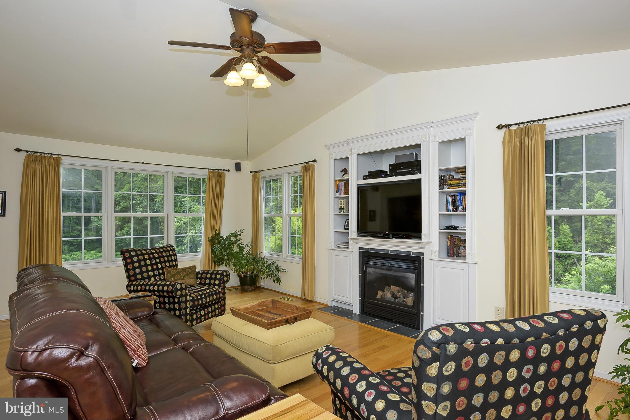 1202 Jones Station Road Arnold, MD 21012 - Photo 10 of 30 FR has cathedral ceiling & gas fireplace.