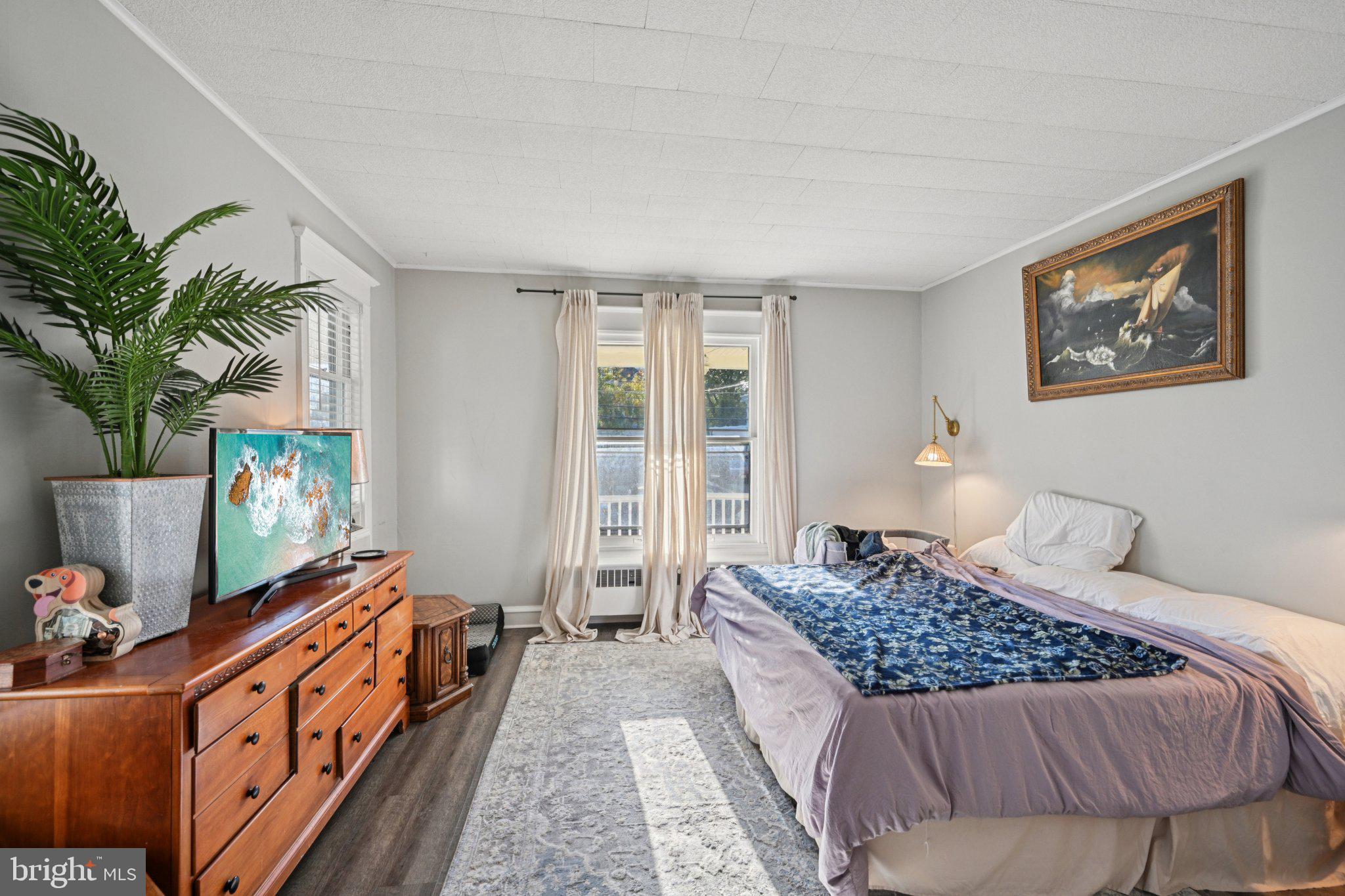 127 7th Avenue Haddon Heights, NJ 08035 - Photo 16 of 47 a bed room with a bed and a couch