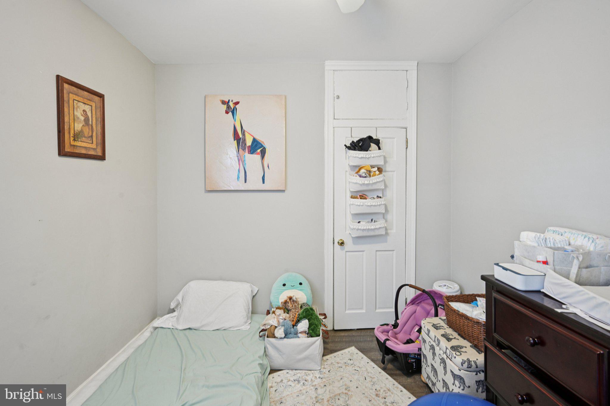 127 7th Avenue Haddon Heights, NJ 08035 - Photo 20 of 47 a bedroom with a bed and wooden floor