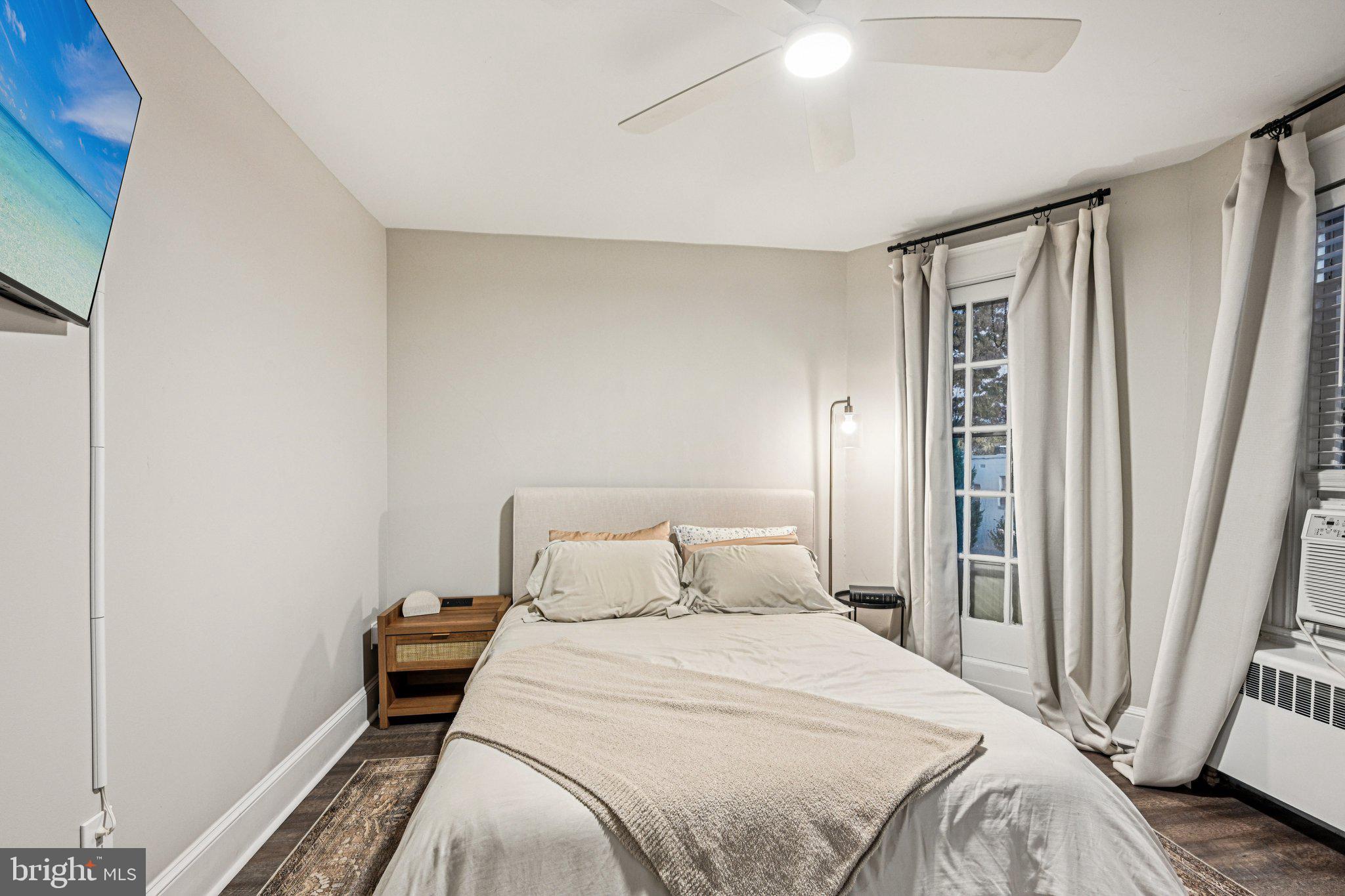 127 7th Avenue Haddon Heights, NJ 08035 - Photo 31 of 47 a bedroom with a bed and a window