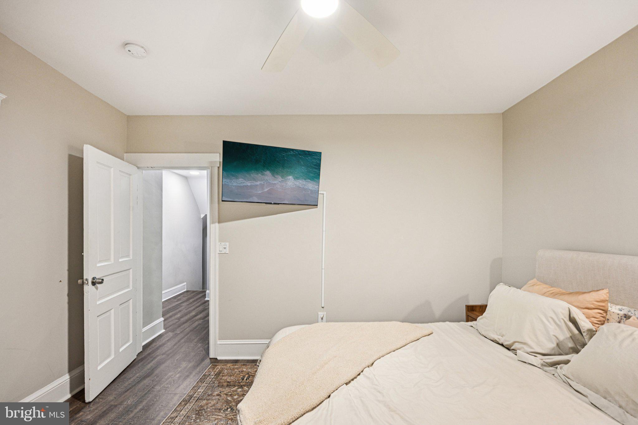 127 7th Avenue Haddon Heights, NJ 08035 - Photo 34 of 47 a bedroom with a bed and a couch