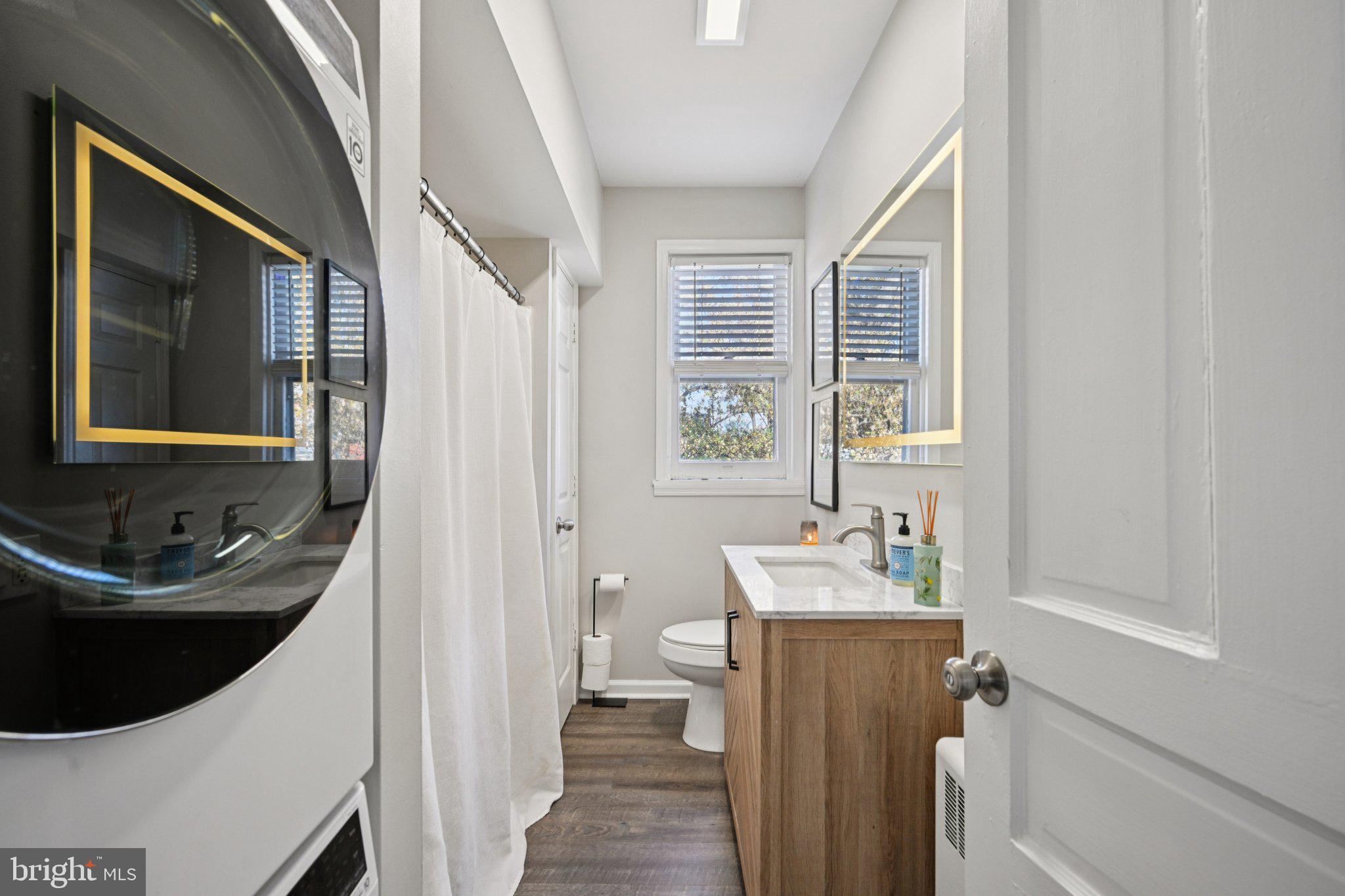 127 7th Avenue Haddon Heights, NJ 08035 - Photo 35 of 47 a bathroom with a sink a toilet and a bathtub