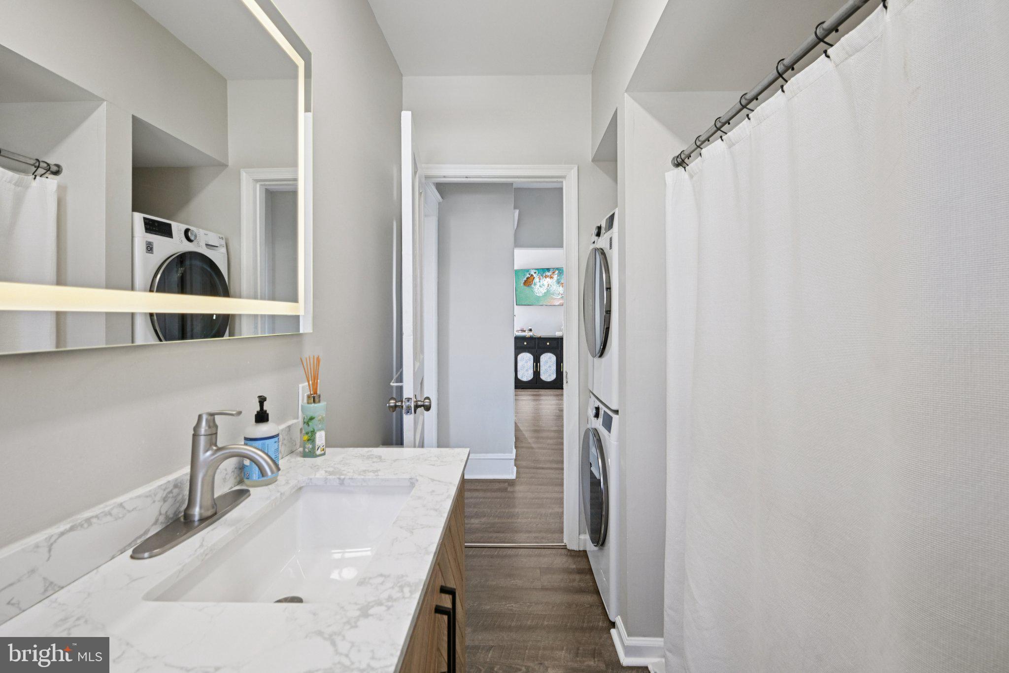 127 7th Avenue Haddon Heights, NJ 08035 - Photo 36 of 47 a en suite bathroom with a sink and mirror
