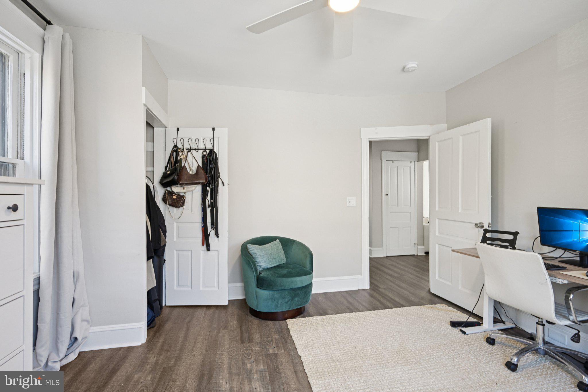 127 7th Avenue Haddon Heights, NJ 08035 - Photo 37 of 47 a view of a workspace with furniture and wooden floor