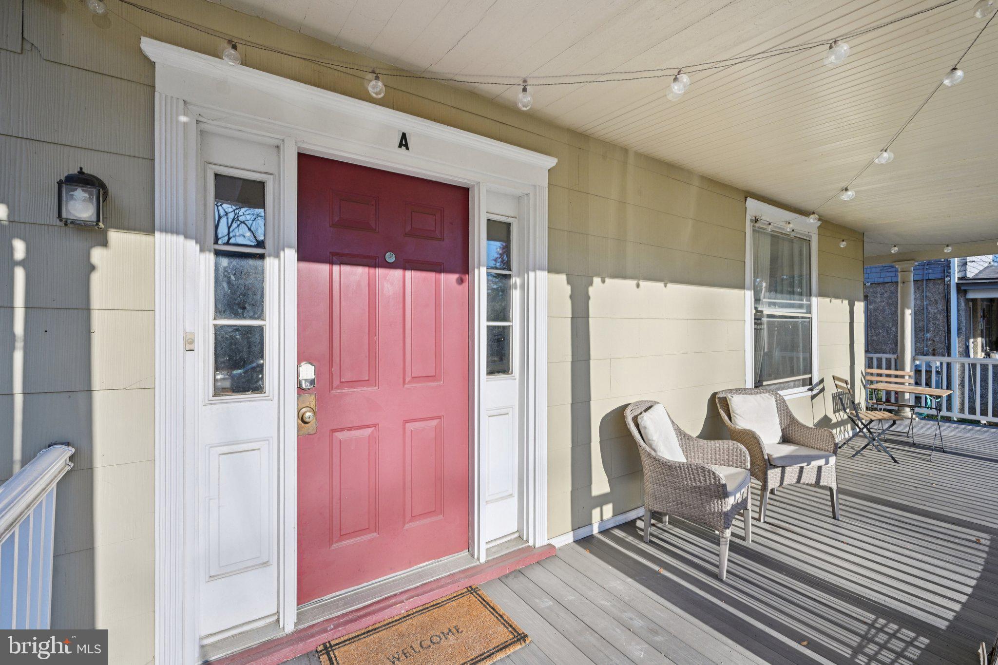 127 7th Avenue Haddon Heights, NJ 08035 - Photo 4 of 47 a living room with furniture a rug and white walls