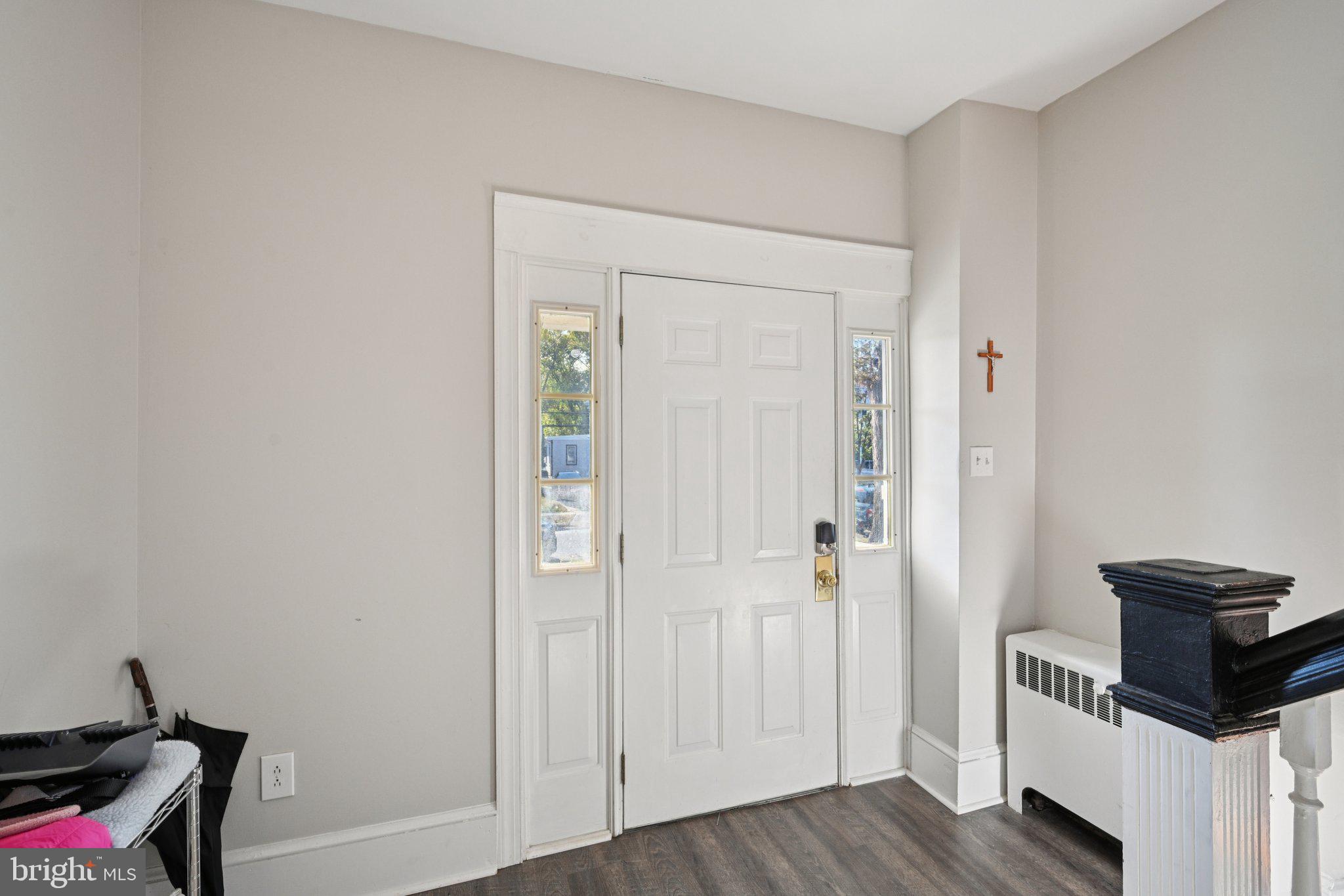 127 7th Avenue Haddon Heights, NJ 08035 - Photo 5 of 47 a view of a hallway with wooden floor and closet