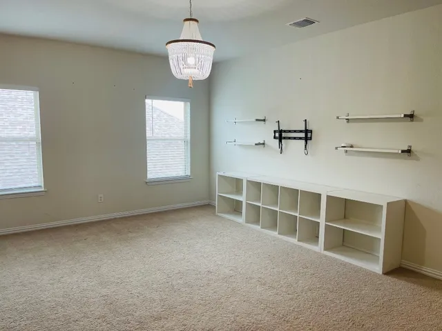 a view of a livingroom with furniture