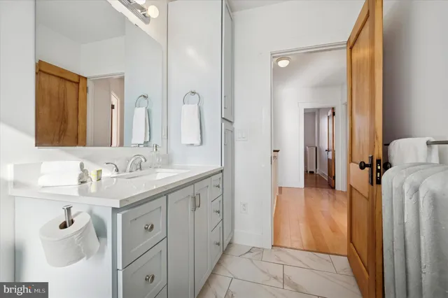 a view of an empty room with windows