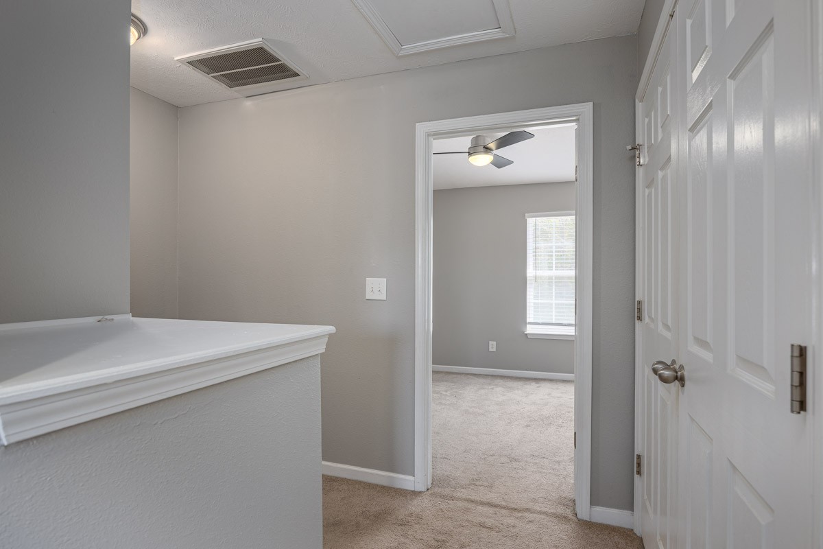 2042 Shaylin Loop Antioch, TN 37013 - Photo 22 of 54 a en suite bathroom with a granite countertop sink and a mirror