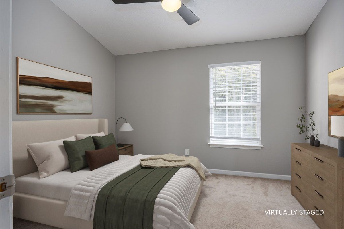 2042 Shaylin Loop Antioch, TN 37013 - Photo 24 of 54 a bedroom with a bed and a window