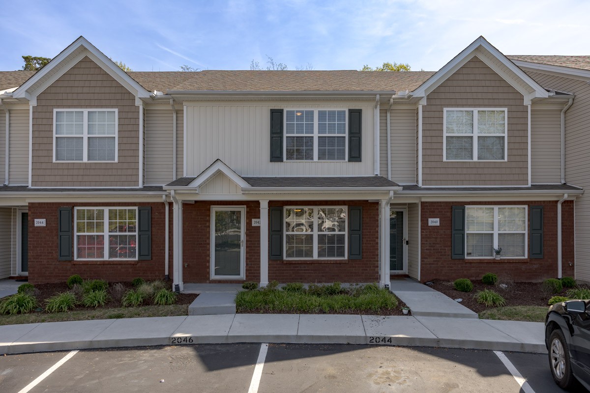 2042 Shaylin Loop Antioch, TN 37013 - Photo 3 of 54 a front view of a house with garden