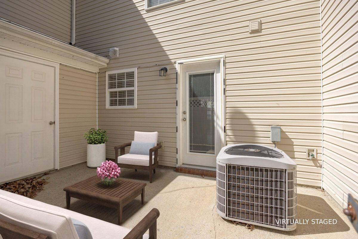 2042 Shaylin Loop Antioch, TN 37013 - Photo 37 of 54 a view of a patio with couches and potted plants