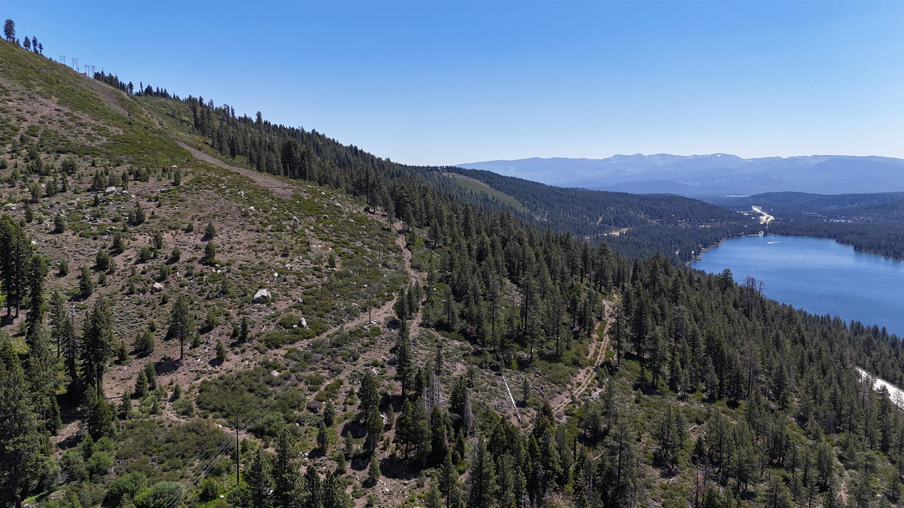 0 No Street Truckee, CA 96161 - Photo 15 of 27 a view of a dry yard with mountains in the background