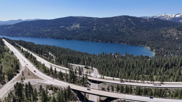 a view of a street with a mountain in the background