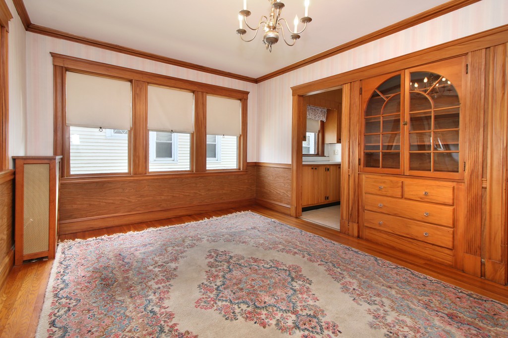 58-60 Matignon Road Cambridge, MA 02140 - Photo 11 of 16 a view of an empty room with a window