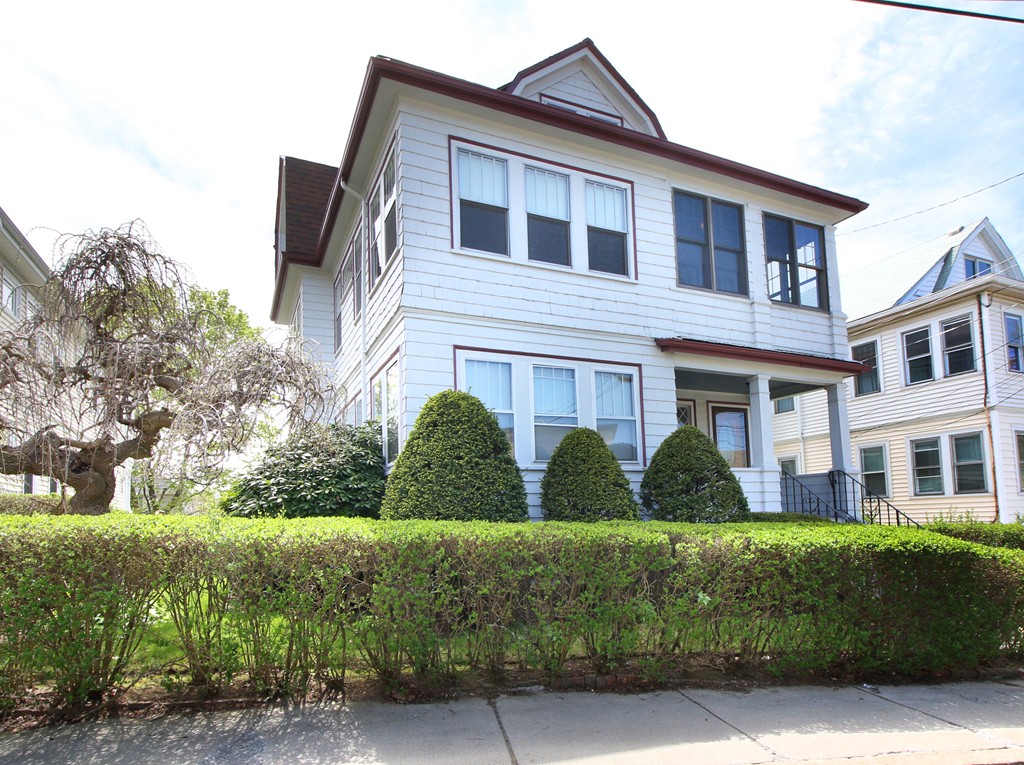 58-60 Matignon Road Cambridge, MA 02140 - Photo 16 of 16 a front view of a house with garden