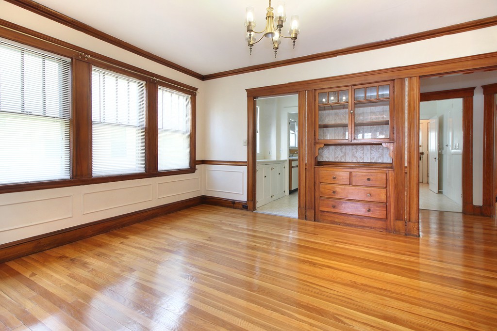 58-60 Matignon Road Cambridge, MA 02140 - Photo 2 of 16 a view of an empty room with a window