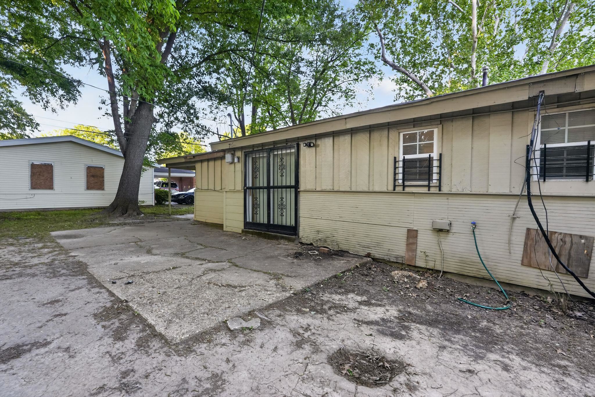 4504 Neely Road Memphis, TN 38109 - Photo 3 of 32 a view of a house with a backyard