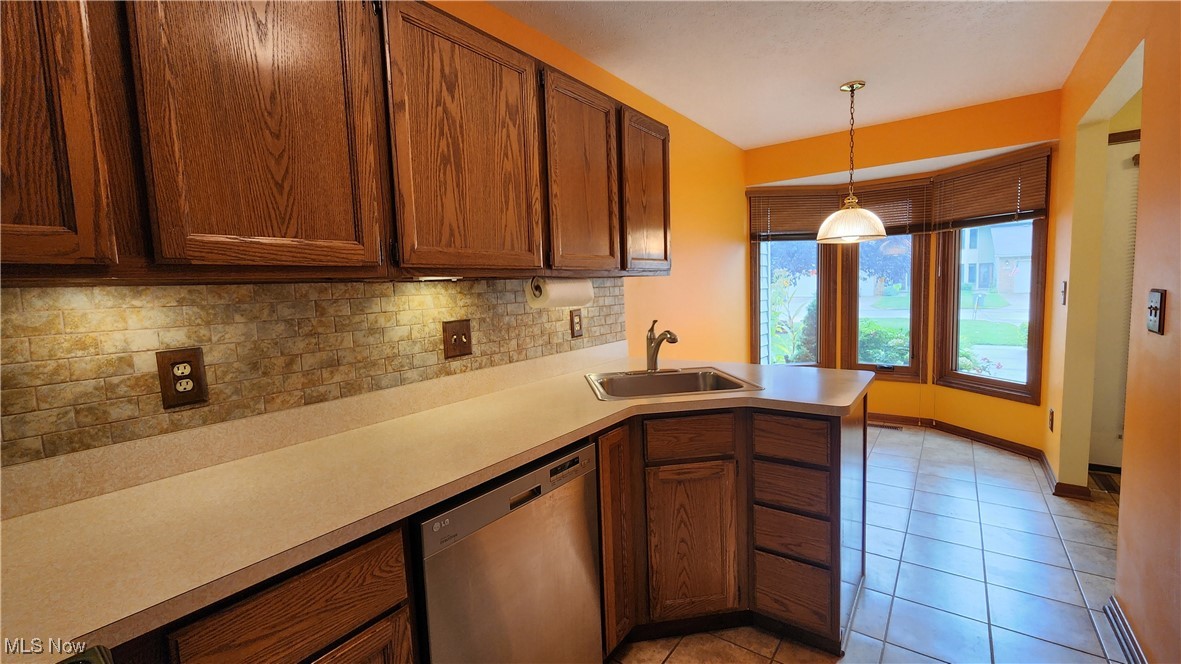 15446 Roxboro Drive Cleveland, OH 44130 - Photo 5 of 20 Kitchen featuring under-cabinet lighting and dining area