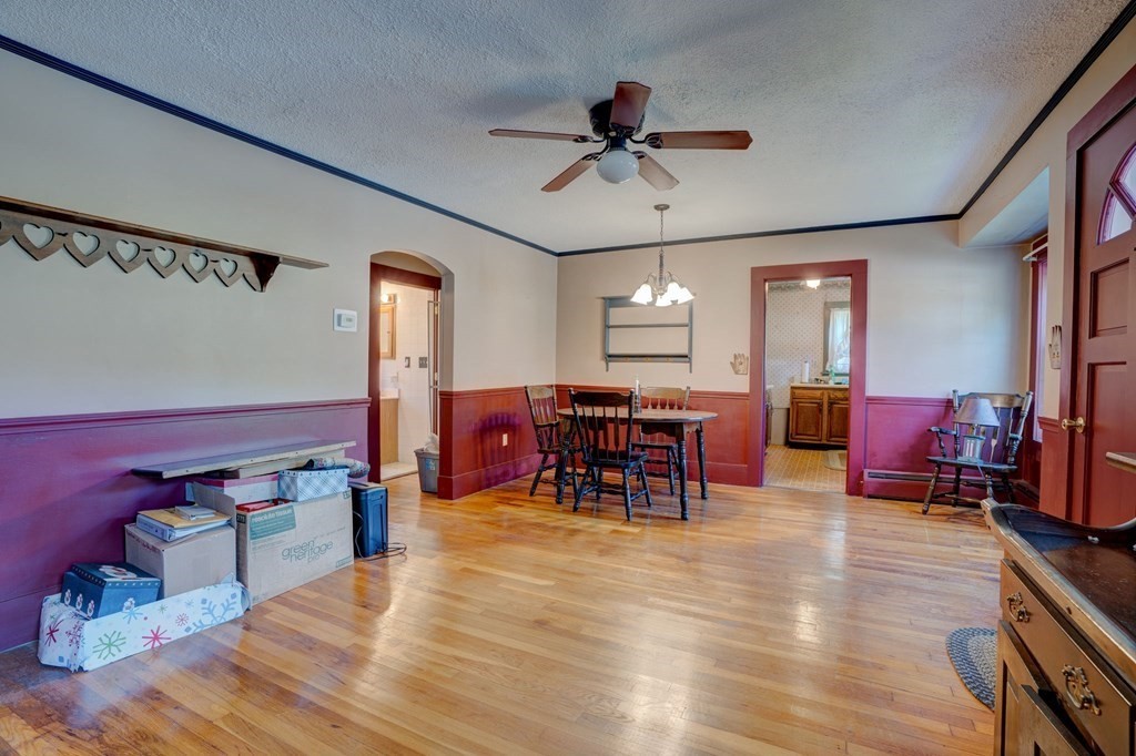 210 Belchertown Road Ware, MA 01082 - Photo 14 of 25 a view of a dining room with furniture and chandelier