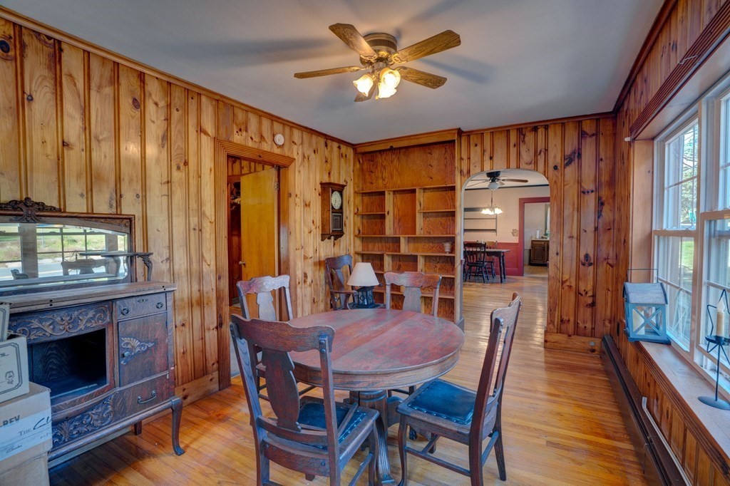 210 Belchertown Road Ware, MA 01082 - Photo 18 of 25 a view of a dining room with furniture window and wooden floor