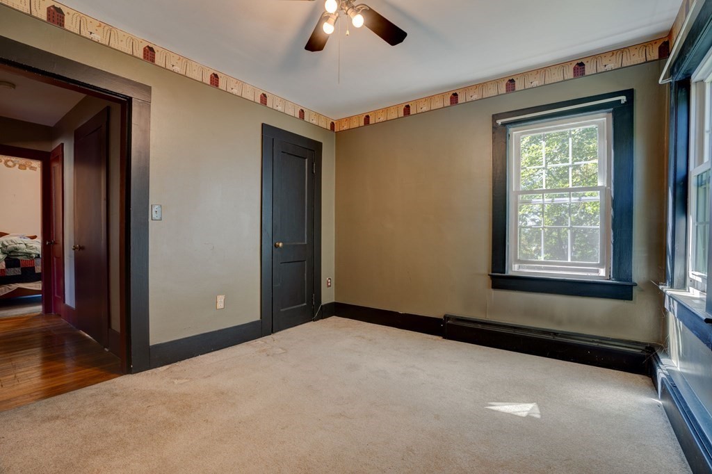 210 Belchertown Road Ware, MA 01082 - Photo 20 of 25 a view of an empty room with a window
