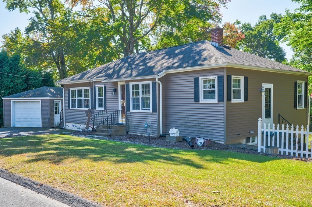 210 Belchertown Road Ware, MA 01082 - Photo 2 of 25 a view of a house with a yard deck and a large tree