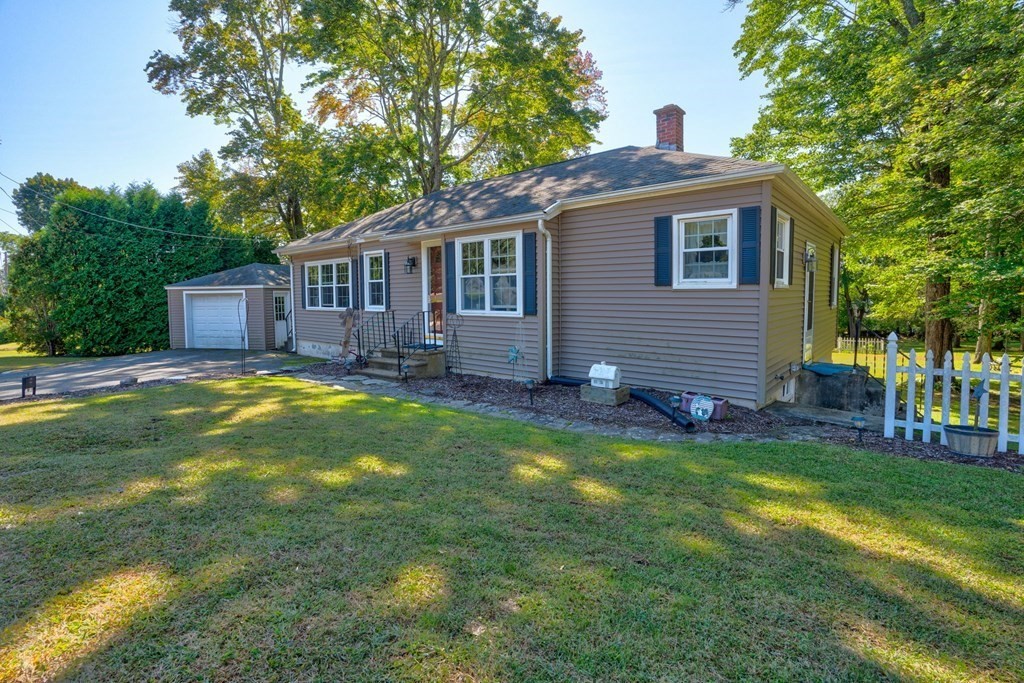 210 Belchertown Road Ware, MA 01082 - Photo 4 of 25 a front view of house with yard and swimming pool